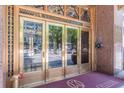Detailed view of the William-Oliver Building's elegant brass double doors at 32 Peachtree Nw St # 1106, Atlanta, GA 30303