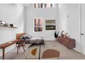 Well-lit bedroom with hardwood floors and a modern aesthetic at 775 Juniper Ne St # 619, Atlanta, GA 30308