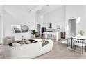 Modern kitchen with island, stainless steel appliances, and hardwood floors at 775 Juniper Ne St # 619, Atlanta, GA 30308