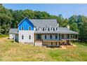 Farmhouse under construction, two-story home with large porch at 776 Old Lathemtown Road, Canton, GA 30115