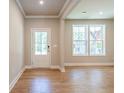 Bright entryway with natural light and hardwood floors at 7640 Homer Dr, Cumming, GA 30028