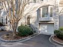 Townhome exterior with attached garage and landscaping at 1532 Oak Grove Rd, Decatur, GA 30033