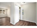 Hallway with linen closet and wood-look flooring at 2625 Abner Nw, Atlanta, GA 30318