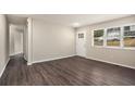 Bright living room with hardwood floors and an open floor plan at 2625 Abner Nw, Atlanta, GA 30318
