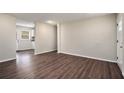 Spacious living area featuring dark hardwood floors and neutral walls at 2625 Abner Nw, Atlanta, GA 30318