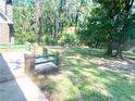 Spacious backyard with patio and wooded area at 5940 Old Bill Cook Rd, Atlanta, GA 30349
