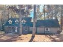 Ranch home with attached garage and mature trees at 5940 Old Bill Cook Rd, Atlanta, GA 30349
