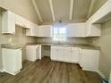 Renovated kitchen, granite counters, white cabinets at 5940 Old Bill Cook Rd, Atlanta, GA 30349