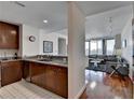 Kitchen with granite countertops, stainless steel appliances, and open view to living room at 3338 Ne Peachtree Ne Rd # 1102, Atlanta, GA 30326