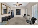 Game room with dartboard, entertainment center, and comfortable seating at 102 Twilight Overlook, Canton, GA 30114