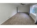 Spacious living room with neutral walls and carpet at 2652 Winthrop Rd, Atlanta, GA 30337