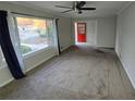 Bright living room featuring large windows and red door at 2652 Winthrop Rd, Atlanta, GA 30337