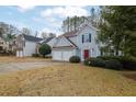 Two-story home with a two-car garage, nestled in a quiet neighborhood at 4289 Brighton Nw Way, Kennesaw, GA 30144