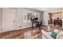 Hardwood floor living room with view into dining area and office space at 3090 Karen Ne Ln, Marietta, GA 30062