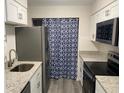 Updated kitchen featuring white shaker cabinets, stainless steel appliances, and granite countertops at 1166 Booth Sw Rd # 610, Marietta, GA 30008