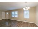 Bright living room with hardwood floors and neutral walls at 2479 Brentwood Rd, Decatur, GA 30032
