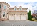 Three-car garage with paver driveway at 2267 Valla Parc Ct, Marietta, GA 30062