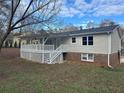 Spacious backyard with a deck, perfect for outdoor entertaining at 3967 Evelyn Dr, Powder Springs, GA 30127