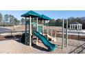 playground with a slide and climbing features at 1090 Cades Walk # 178, Lawrenceville, GA 30045