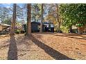 Spacious backyard with trees and shade, perfect for outdoor activities at 1986 Twin Falls Rd, Decatur, GA 30032