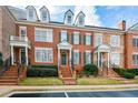 Beautiful brick townhome with a welcoming entrance and manicured landscaping at 4754 Ivy Ridge Se Dr # 1, Atlanta, GA 30339