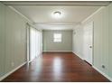 Bonus room with wood-look floors, sliding glass doors, and neutral paint at 3930 Wedgefield Cir, Decatur, GA 30035