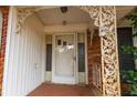 Front porch with decorative metal railings and glass front door at 750 Mount Vernon Hwy, Atlanta, GA 30327