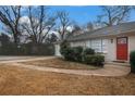 House exterior showcasing a red front door and walkway at 2072 Whites Mill Rd, Decatur, GA 30032