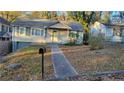 The front yard features a concrete walkway leading to the home's entrance at 2065 Detroit Nw Ave, Atlanta, GA 30314