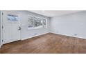 Bright living room with hardwood floors and large windows at 1933 Glen Echo Dr, Decatur, GA 30032