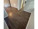 Bright living room with dark laminate floors at 2030 Shamrock Dr, Decatur, GA 30032