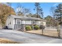 Front view of house with driveway and yard at 1035 Stonewall Se Dr, Atlanta, GA 30315