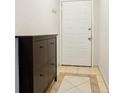 Entryway with tile flooring and shoe storage at 408 River Run Dr, Atlanta, GA 30350