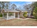 Home with covered porch and deck at 3435 Misty Valley Rd, Decatur, GA 30032