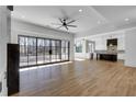 Spacious living room features hardwood floors and a wall of windows at 1254 Prospect Rd, Lawrenceville, GA 30043