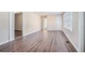 Spacious living area with light walls and wood-look flooring at 1786 Ledo Ave, Decatur, GA 30035
