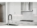 Modern kitchen with stainless steel appliances and white shaker cabinets at 2425 Peachtree Ne Rd # 1106, Atlanta, GA 30305