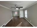 Bright living room with hardwood floors and neutral walls at 721 Yale Sw Pl, Atlanta, GA 30315