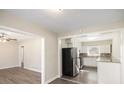 Open kitchen with granite countertops and stainless steel appliances at 1620 Flintwood Se Dr, Atlanta, GA 30316
