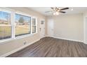 Bright living room featuring large windows and wood-look floors at 1620 Flintwood Se Dr, Atlanta, GA 30316
