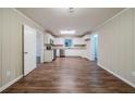 Renovated kitchen with stainless steel appliances and light wood flooring at 1471 Midview Dr, Decatur, GA 30032