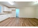 Bright kitchen featuring white cabinets and granite countertops at 1471 Midview Dr, Decatur, GA 30032