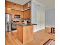 Modern kitchen with island and hardwood floors at 57 Forsyth Nw St # 4D, Atlanta, GA 30303
