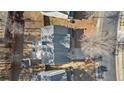 Aerial view showcasing the house layout, backyard, and surrounding area at 250 Windsor Way, Fairburn, GA 30213