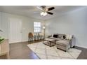 Living room features hardwood floors and neutral color palette at 3149 Buford Ne Hwy # 7, Atlanta, GA 30329