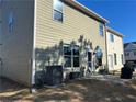 Well-maintained house exterior, featuring a patio, and landscaping at 3885 Nixon Grove Dr, Douglasville, GA 30135