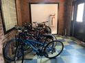 Room with multiple bicycles, fire extinguisher, and checkered floor at 1031 State Nw St # 103, Atlanta, GA 30318