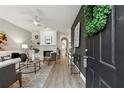 Bright and airy entryway with modern decor and hardwood floors at 2556 Longcourt Se Cir # 4, Atlanta, GA 30339