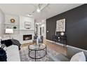 Spacious living room featuring a fireplace and stylish furnishings at 2556 Longcourt Se Cir # 4, Atlanta, GA 30339