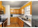 Bright kitchen with light wood cabinets and granite countertops at 3361 Highway 3 N, Hampton, GA 30228